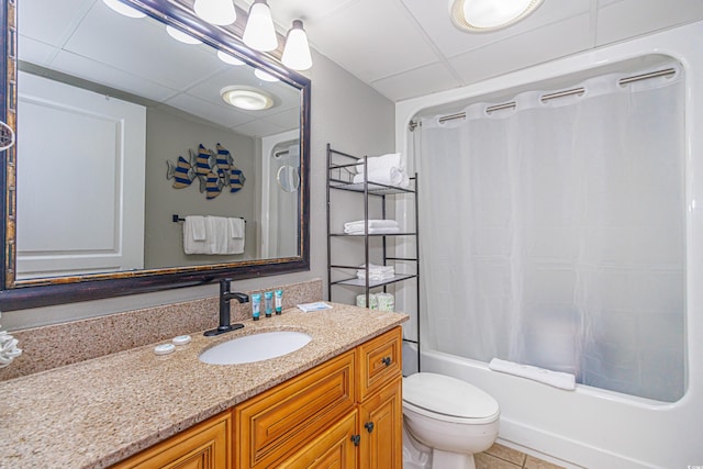 7100 N Ocean Blvd Unit 1421, Myrtle Beach, SC 29572 - bathroom featuring a paneled ceiling, vanity, toilet, shower / bath combination with curtain, and tile patterned flooring