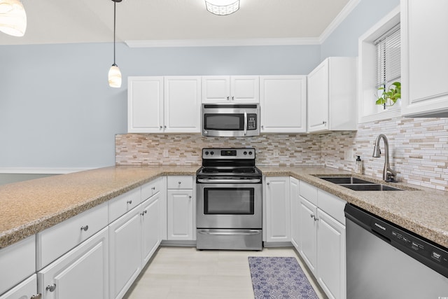 4767 Wild Iris Dr Unit 203, Myrtle Beach, SC 29579 - kitchen with appliances with stainless steel finishes, a sink, ornamental molding, white cabinetry, and light countertops