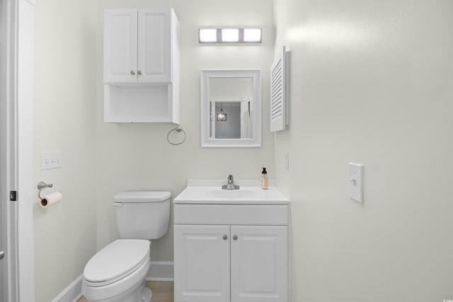 4767 Wild Iris Dr Unit 203, Myrtle Beach, SC 29579 - half bath featuring vanity, toilet, and baseboards