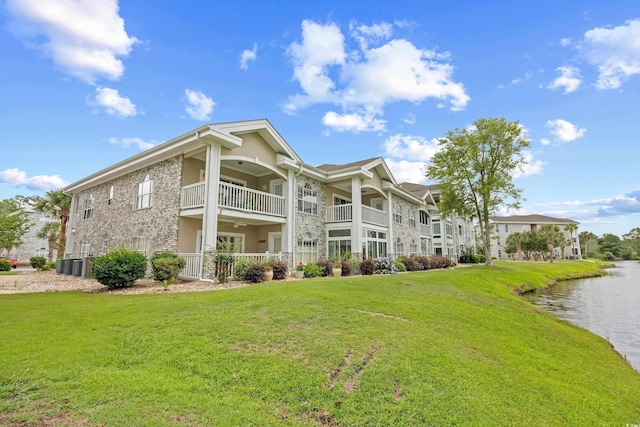 4767 Wild Iris Dr Unit 203, Myrtle Beach, SC 29579 - view of building exterior with a water view and cooling unit