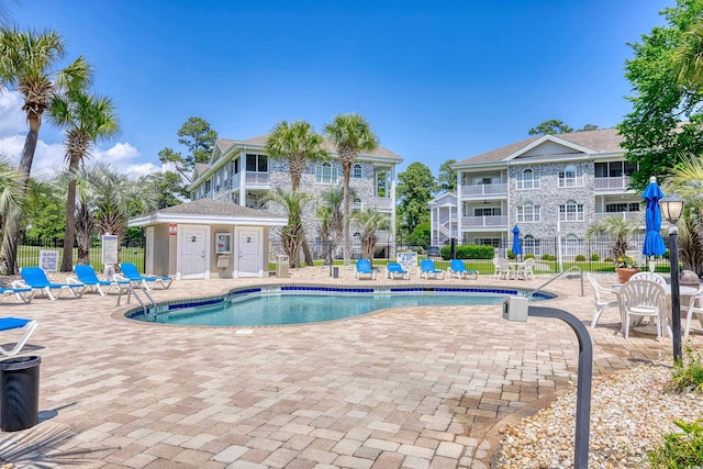 4767 Wild Iris Dr Unit 203, Myrtle Beach, SC 29579 - community pool with a patio area