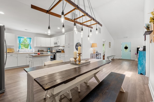 1936 Lees Landing Cir, Conway, SC 29526 - dining room featuring high vaulted ceiling, light wood-style flooring, and recessed lighting