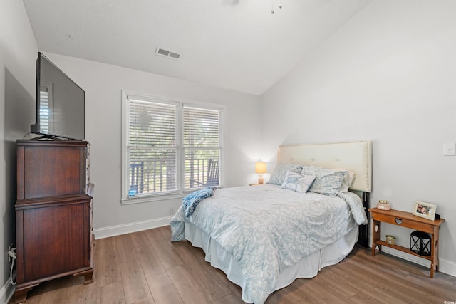 1936 Lees Landing Cir, Conway, SC 29526 - bedroom featuring lofted ceiling and wood finished floors
