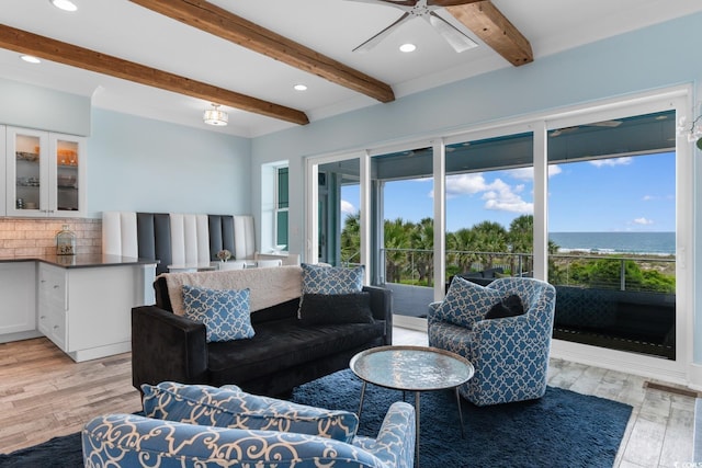 4900 N Ocean Blvd, Myrtle Beach, SC 29577 - living area featuring healthy amount of natural light, light wood finished floors, beam ceiling, a ceiling fan, and recessed lighting