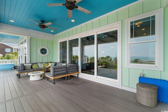 4900 N Ocean Blvd, Myrtle Beach, SC 29577 - wooden deck with a ceiling fan and an outdoor living space