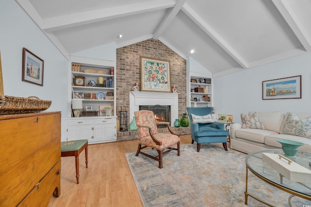 196 John Waites Ct, Georgetown, SC 29440 - living room featuring light wood-style floors, a fireplace, and built in shelves