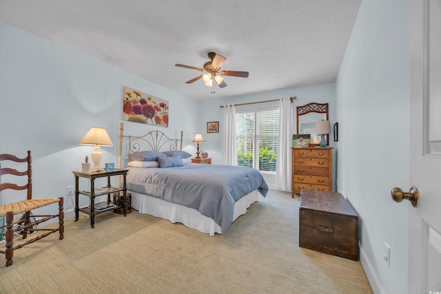 196 John Waites Ct, Georgetown, SC 29440 - carpeted bedroom featuring a textured ceiling and a ceiling fan