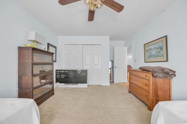 196 John Waites Ct, Georgetown, SC 29440 - bedroom featuring light colored carpet, a closet, and ceiling fan