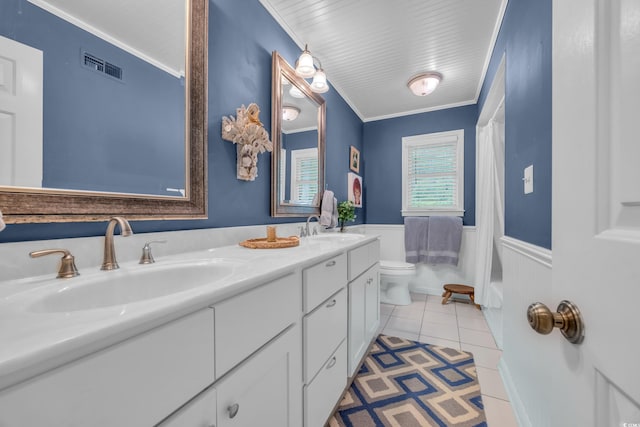 196 John Waites Ct, Georgetown, SC 29440 - full bathroom with a wainscoted wall, double vanity, toilet, tile patterned floors, and crown molding