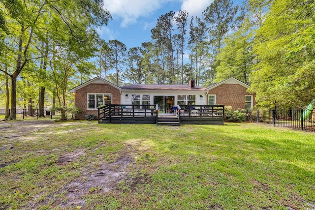196 John Waites Ct, Georgetown, SC 29440 - rear view of property featuring brick siding, a chimney, and a wooden deck