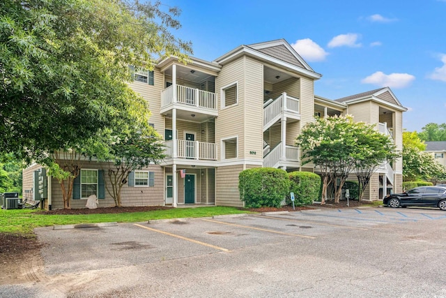 6016 Dick Pond Rd Unit 109, Myrtle Beach, SC 29588 - view of property featuring uncovered parking and central AC unit