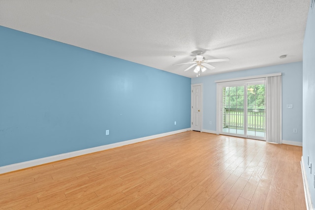 6016 Dick Pond Rd Unit 109, Myrtle Beach, SC 29588 - spare room with a ceiling fan, baseboards, light wood-type flooring, and a textured ceiling