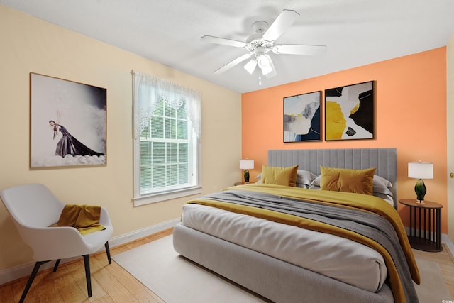 6016 Dick Pond Rd Unit 109, Myrtle Beach, SC 29588 - bedroom featuring baseboards, wood finished floors, and a ceiling fan