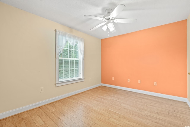 6016 Dick Pond Rd Unit 109, Myrtle Beach, SC 29588 - spare room with baseboards, ceiling fan, and light wood finished floors