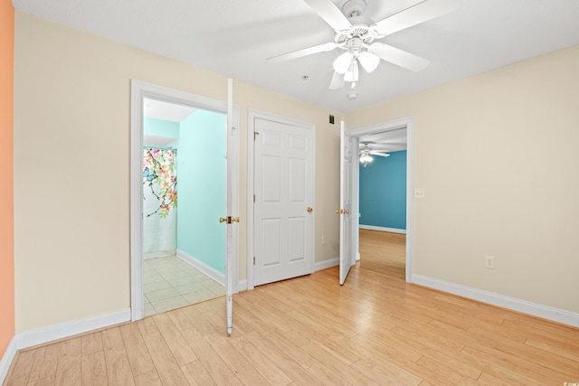 6016 Dick Pond Rd Unit 109, Myrtle Beach, SC 29588 - unfurnished bedroom with light wood-style flooring, baseboards, and a ceiling fan