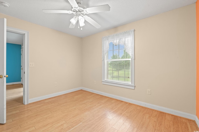 6016 Dick Pond Rd Unit 109, Myrtle Beach, SC 29588 - unfurnished room with baseboards, light wood finished floors, ceiling fan, and a smoke detector