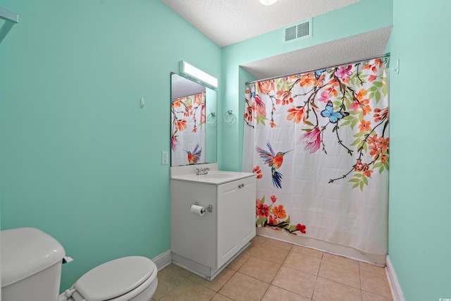 6016 Dick Pond Rd Unit 109, Myrtle Beach, SC 29588 - full bath featuring toilet, vanity, tile patterned floors, a textured ceiling, and baseboards