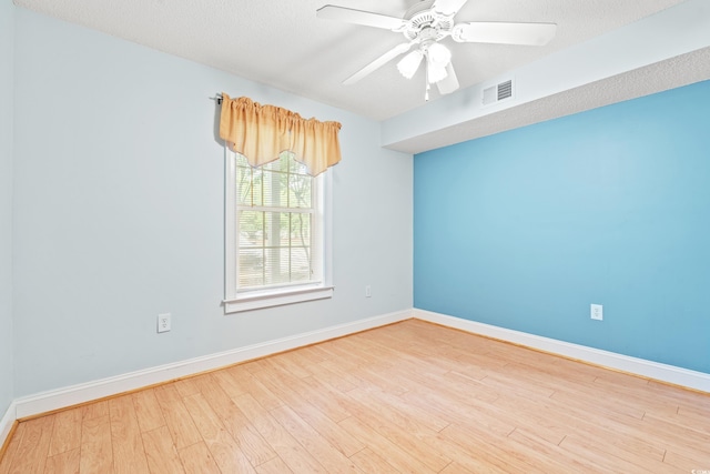 6016 Dick Pond Rd Unit 109, Myrtle Beach, SC 29588 - unfurnished room with wood finished floors, baseboards, and a ceiling fan