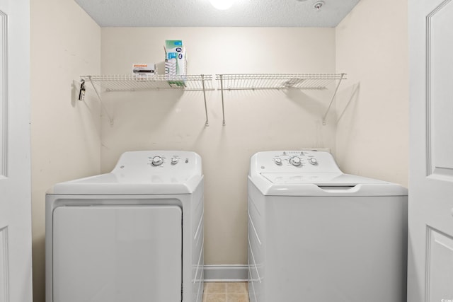 6016 Dick Pond Rd Unit 109, Myrtle Beach, SC 29588 - washroom featuring separate washer and dryer and a textured ceiling