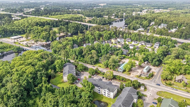 6016 Dick Pond Rd Unit 109, Myrtle Beach, SC 29588 - aerial view of property's location featuring a large body of water, nearby suburban area, and a forest