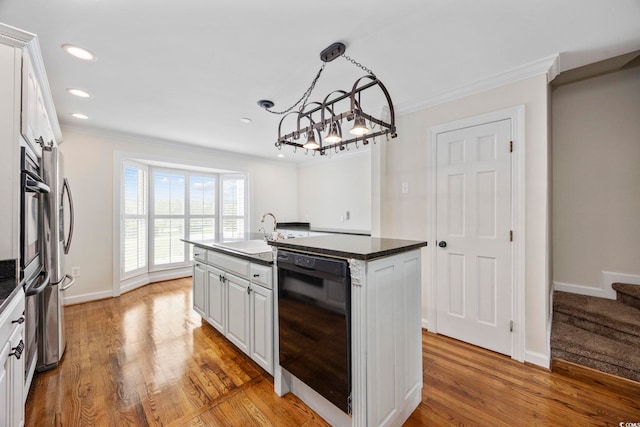 465 Vereen Rd Unit 10, Murrells Inlet, SC 29576 - kitchen with dishwasher, a sink, crown molding, a chandelier, and a kitchen island with sink