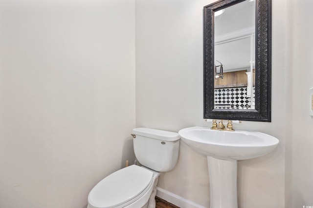 465 Vereen Rd Unit 10, Murrells Inlet, SC 29576 - bathroom with toilet, baseboards, and wood finished floors