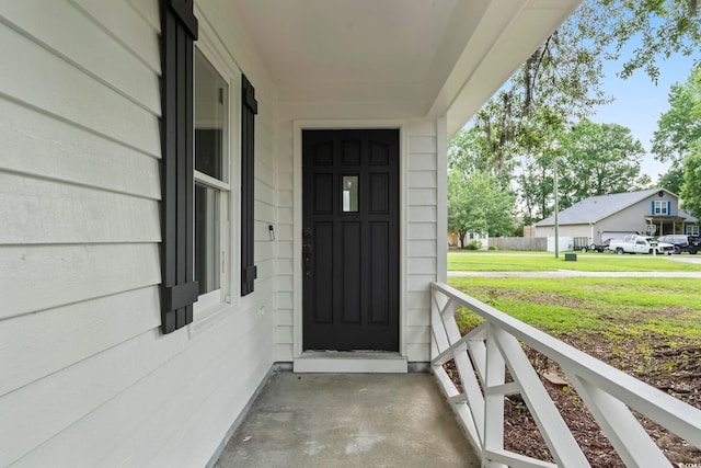 203 Deer Trce, Myrtle Beach, SC 29588 - doorway to property featuring covered porch