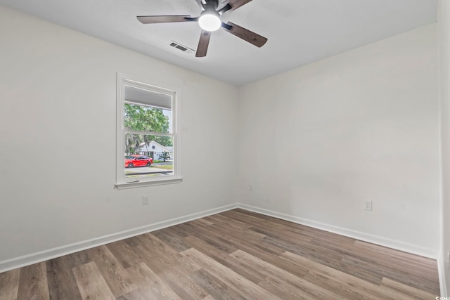 203 Deer Trce, Myrtle Beach, SC 29588 - empty room featuring wood finished floors, ceiling fan, and baseboards