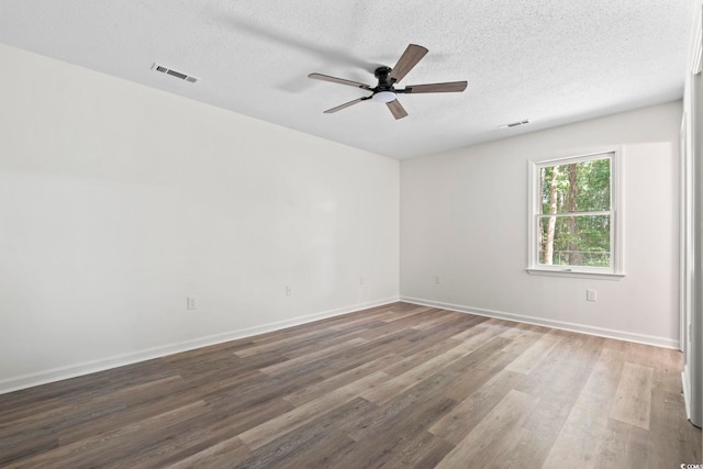 203 Deer Trce, Myrtle Beach, SC 29588 - spare room with ceiling fan, wood finished floors, a textured ceiling, and baseboards