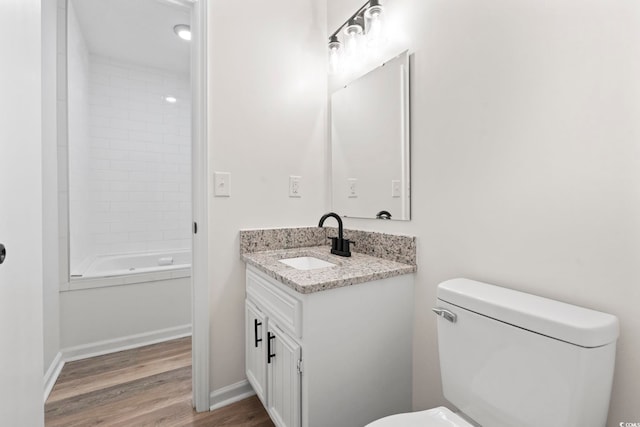 203 Deer Trce, Myrtle Beach, SC 29588 - full bath featuring vanity, toilet, wood finished floors, washtub / shower combination, and baseboards