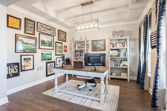 981 Mourning Dove Dr, Myrtle Beach, SC 29577 - home office with a tray ceiling, wood finished floors, and baseboards