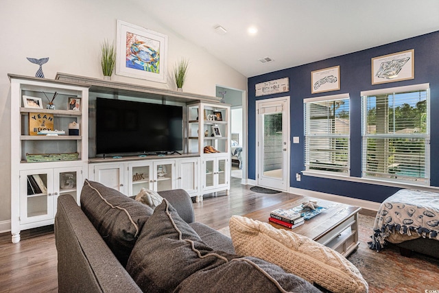 981 Mourning Dove Dr, Myrtle Beach, SC 29577 - living area with wood finished floors, vaulted ceiling, and baseboards
