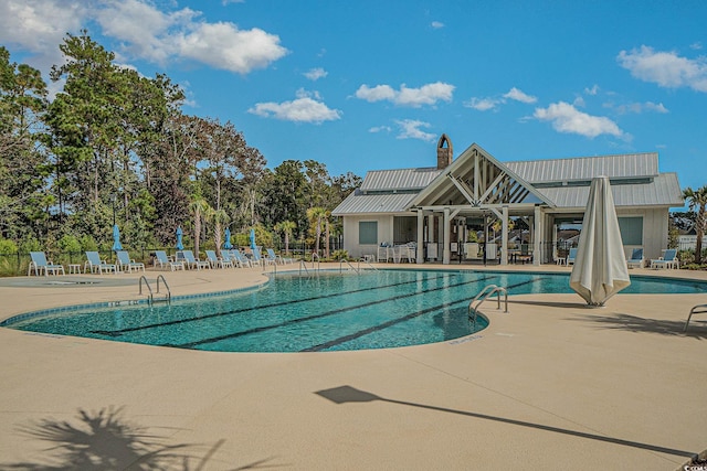 981 Mourning Dove Dr, Myrtle Beach, SC 29577 - community pool with a patio area