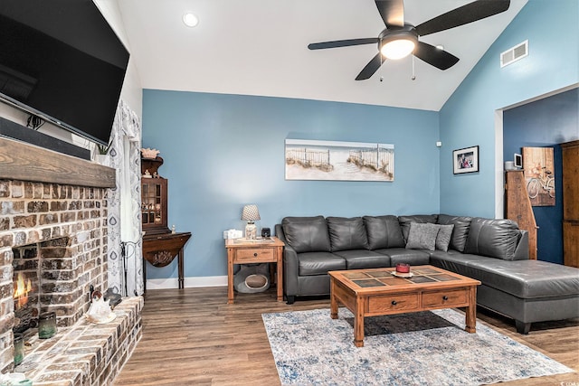 1904 Ronald Phillips Ave, Conway, SC 29527 - living area featuring a ceiling fan, wood finished floors, high vaulted ceiling, baseboards, and a fireplace
