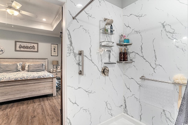 1904 Ronald Phillips Ave, Conway, SC 29527 - full bathroom with ornamental molding, a marble finish shower, wood finished floors, a ceiling fan, and a tray ceiling