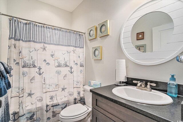 1904 Ronald Phillips Ave, Conway, SC 29527 - bathroom featuring toilet, vanity, and a shower with curtain