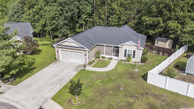 1904 Ronald Phillips Ave, Conway, SC 29527 - view of front facade featuring driveway, an attached garage, and a shingled roof