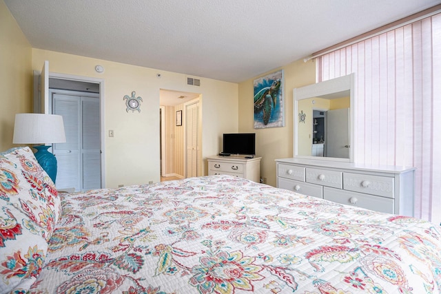 1425 S Ocean Blvd Unit 2A, North Myrtle Beach, SC 29582 - bedroom with a textured ceiling