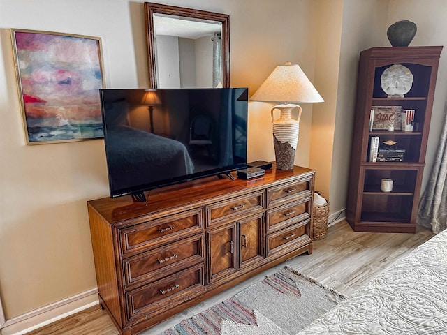 2101 S Ocean Blvd Unit A-4, North Myrtle Beach, SC 29582 - bedroom with light wood finished floors and baseboards