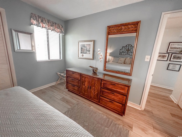 2101 S Ocean Blvd Unit A-4, North Myrtle Beach, SC 29582 - bedroom with light wood finished floors and baseboards