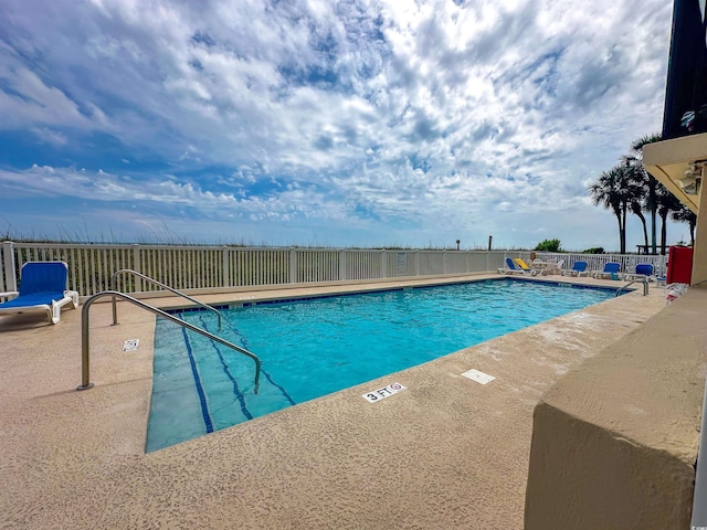 2101 S Ocean Blvd Unit A-4, North Myrtle Beach, SC 29582 - community pool featuring a patio area
