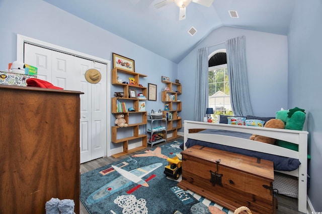 5149 Morning Frost Pl, Myrtle Beach, SC 29579 - bedroom featuring wood finished floors, vaulted ceiling, a closet, ceiling fan, and baseboards