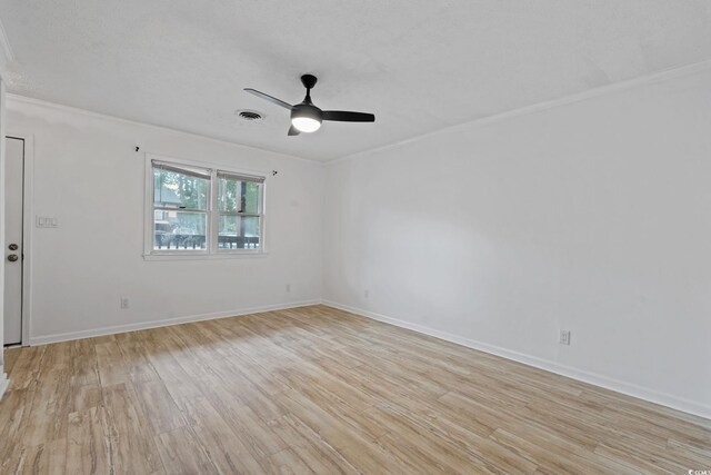 218 Waccamaw Village Dr Unit 218, Myrtle Beach, SC 29579 - empty room featuring light wood-style floors, ceiling fan, baseboards, and crown molding