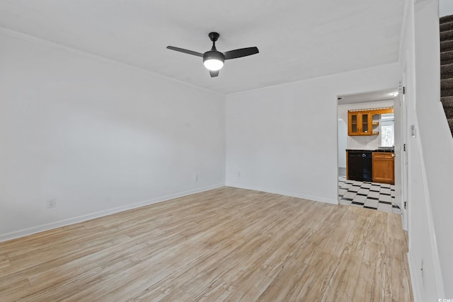 218 Waccamaw Village Dr Unit 218, Myrtle Beach, SC 29579 - empty room featuring crown molding, light wood-style floors, a ceiling fan, stairs, and baseboards