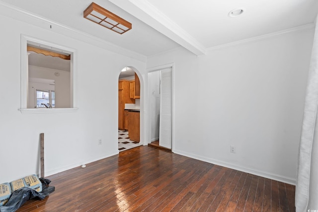 218 Waccamaw Village Dr Unit 218, Myrtle Beach, SC 29579 - spare room featuring dark wood finished floors, crown molding, arched walkways, and baseboards