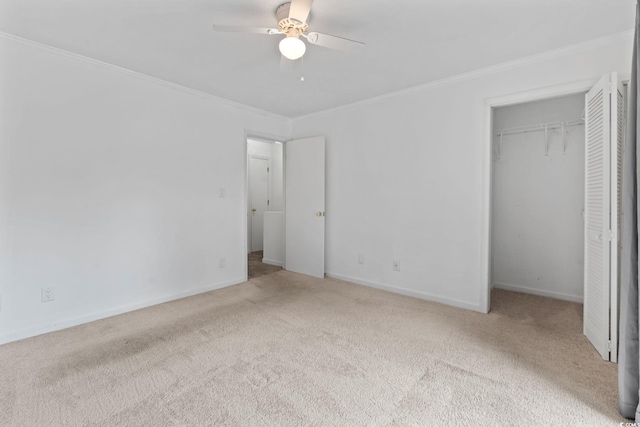 218 Waccamaw Village Dr Unit 218, Myrtle Beach, SC 29579 - unfurnished bedroom with crown molding, carpet flooring, a closet, baseboards, and a ceiling fan