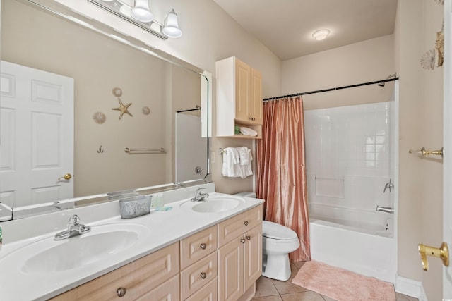 4890 Luster Leaf Cir Unit 201, Myrtle Beach, SC 29577 - bathroom with toilet, double vanity, tile patterned flooring, and shower / bath combo with shower curtain