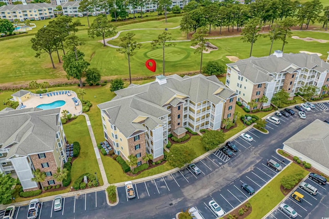 4890 Luster Leaf Cir Unit 201, Myrtle Beach, SC 29577 - drone / aerial view of a golf club and a pool area