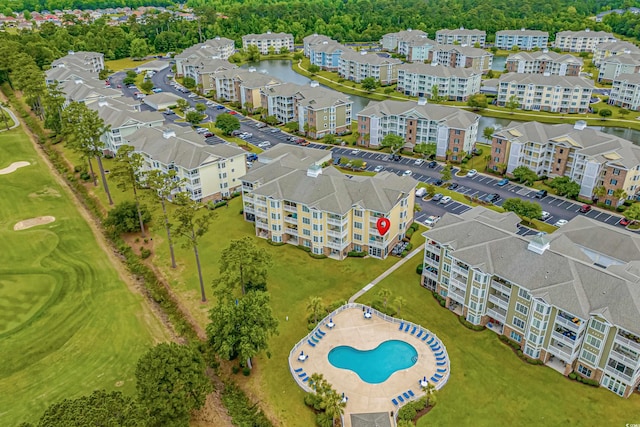 4890 Luster Leaf Cir Unit 201, Myrtle Beach, SC 29577 - bird's eye view of apartment complex, a nearby body of water, a pool area, and a local golf course