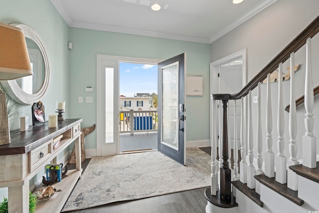 204 33rd Ave N, North Myrtle Beach, SC 29582 - entrance foyer featuring wood finished floors, ornamental molding, stairs, and baseboards